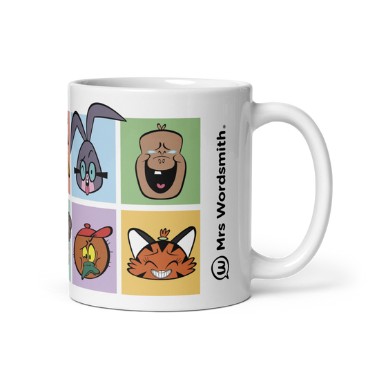 White glossy 11oz mug with cartoon faces, handle on right.